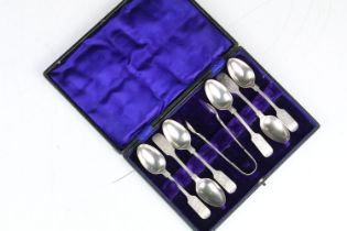 A cased set of six fully hallmarked sterling silver teaspoons with sugar tongs, assay marked for