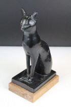 Austin Prod - A 1960's bronzed resin sculpture of a seated cat, impressed 'Austin Prod Inc 1965',