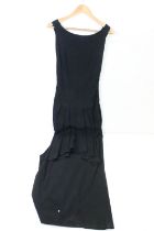 Hartnell of London - A black full length evening dress with side zip and pleating