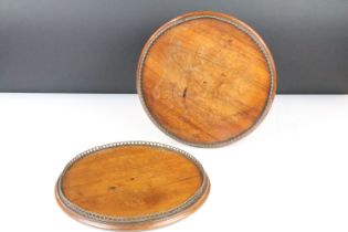 Pair of 19th / Early 20th century Mahogany Circular Trays or Stands with pierced brass galleries,