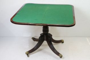 Mahogany Fold-over Card Table in the Regency manner, the hinged lid opening to a green baise playing