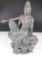 Bronze effect figure of a seated Buddhist female deity, with orb in hand, approx 51cm tall