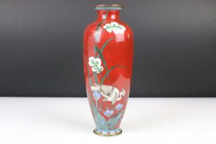 Japanese Cloisonné Vase decorated with a stork amongst flowers on a red ground, 25cm high