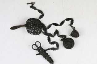A Victorian style bronzed chatelain with scissors, thimble and pin cushion