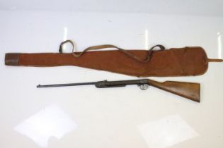 A vintage Tell air rifle together with rifle bag.