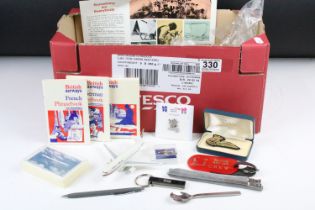 A group of British Airways collectables to include badges, models, cards, games, spoons, books....