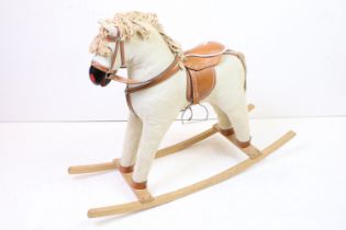 Contemporary fabric-covered wooden rocking horse, with leather saddle & stirrups, mane & tail,