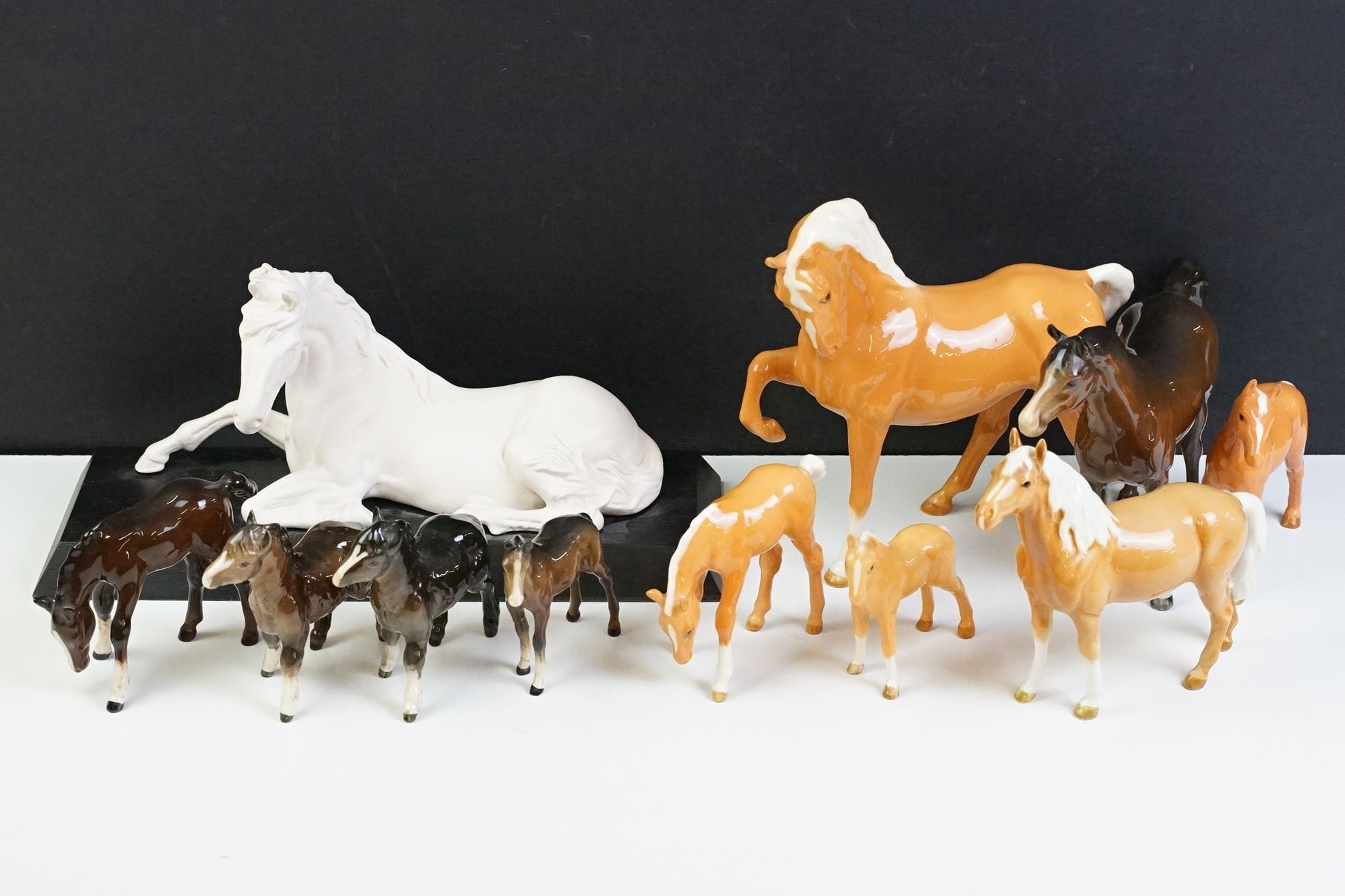 Collection of 10 Beswick porcelain horses to include five Palomino and five brown gloss examples (