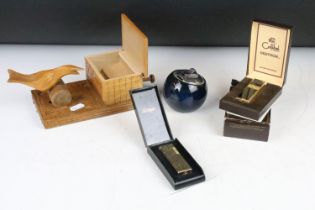 A small group of smoking related collectables to include pocket lighters, cigarette dispenser and