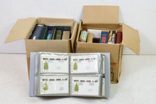 A collection of mainly Channel Islands first day covers within albums together with a quantity of