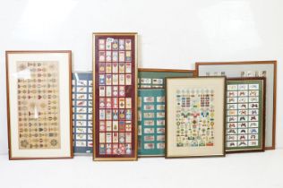 A collection of seven framed and glazed set of cigarette cards together with two framed and glazed