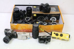 Quantity of SLR and compact cameras with lenses, including Olympus Mju, Nikon and Pentax