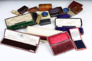 A collection of assorted antique and vintage jewellery retailers boxes.