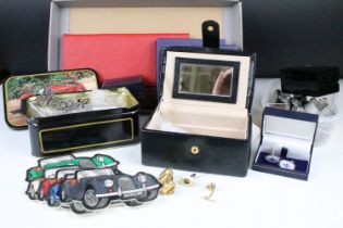 A collection of Morgan Car collectables to include badges, cufflinks, paperknife, watches....etc...