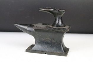 Cast Iron Miniature Cobbler's Anvil by Harper and number 4006 with an attached shoe last, 22cm long