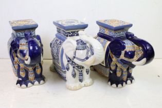 Three 20th century Chinese ceramic elephant garden seats, two with blue ground glaze, the other on