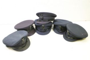 Group of six 20th century G. Jolliffe & Co chauffeur's caps