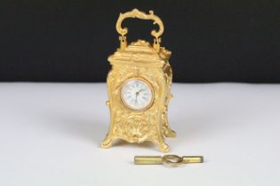 Miniature Carriage Clock in a Rococo style case with key