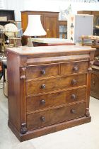 Victorian Flamed Mahogany Chest of Drawers comprising a cushion drawer over two short drawers and