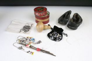 A box of mixed collectables to include silver plated bookmarks, military buttons, antique shoes,