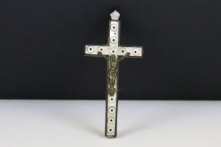 An early 20th century crucifix with mother of pearl decoration, approx 13cm in height.