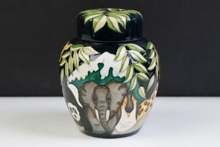 Moorcroft pottery lidded ginger jar having tube lined detailing in the Noah's ark pattern with