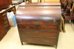Early 19th century Mahogany Campaign Barrel or Cylinder Roll Top Bureau, the cylinder opening to