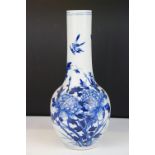 Chinese blue & white bottle vase with floral & ornithological decoration, two blue concentric