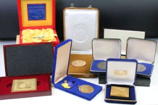 A collection of cased stamp exhibitors medals and medallions.