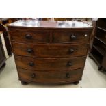 Early 19th century Bow Fronted Mahogany Chest of Two Short over Three Long Drawers raised on bun