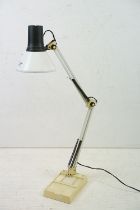 Vintage anglepoise work lamp with metal shade and weighted rectangular plastic base