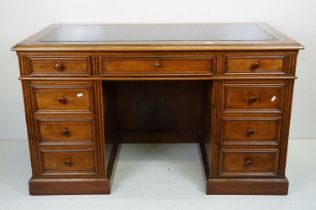 19th century style Mahogany Twin Pedestal Desk with black leather inset top and an arrangement of