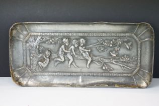 Helmuth Schievelkamp for WMF (1849-1932) - A plated metal tray with repousse decoration of