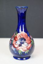 Moorcroft Pottery 'Anemone' pattern vase of bulbous form, on cobalt blue ground, impressed marks