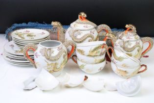 Mid Century Japanese tea set having a white ground with gilt and enamelled dragon detailing,