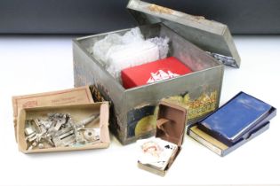 A box of mixed collectables to include coins, sewing collectables, military collectables....etc..