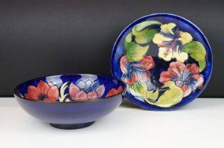 Moorcroft Pottery 'Coral Hibiscus' pattern blue ground bowl (approx 25cm diameter), together with