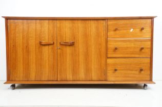 Mid century Retro Teak Sideboard, probably by Bowman Brothers, with three drawers and two cupboard