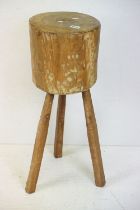 Rustic Drum shaped Chopping Block raised on three splayed legs, 40cm wide x 81cm high