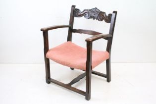 Early 20th century Low Elbow Chair, the top rail carved with a crown and scrolls, 73cm high x 56cm