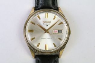 A gents vintage Seiko 5 Sportsmatic Diashock 21 Jewel mechanical wristwatch, day & date function