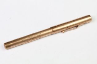 A fully hallmarked 9ct rose gold fountain pen with 14ct gold nib, with inscription to side.