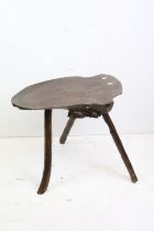 Rustic Table or Stool with shaped root wood top and raised on three legs, 57cm long x 47cm high