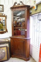 Mahogany Corner Cabinet in the George III Manner, the upper section broken swan neck pediment and