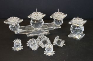 Swarovski crystal three-light candelabrum (18.5cm wide), together with a matching candle holder, and