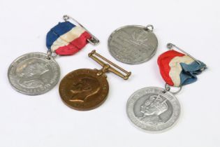 A world war two era Police faithful service medal together with a quantity of coronation medals.