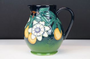Moorcroft Pottery 'Passion Fruit' pattern baluster jug, on a blue-green graduated ground, date