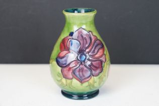 Moorcroft Pottery 'Anemone' pattern green ground baluster vase, impressed marks to base, date code