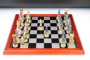 A contemporary 'The Chessmen' hand painted chess set.