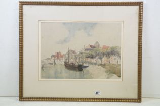 Early 20th Century watercolour, a coastal town view with moored fishing boats, 36.5 x 51.5cm, framed